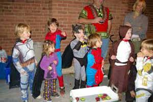 Young trick or treators in costumes