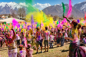People celebrating with colors in Mountains