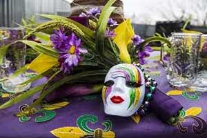 Face masks, beads, and festivities for Fat Tuesday