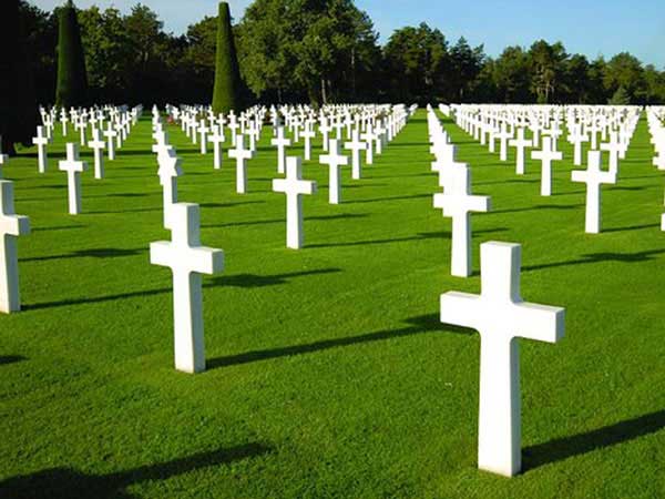 White marble crosses at grave sites in Luxembourg American Cemetery and Memorial in Luxembourg.