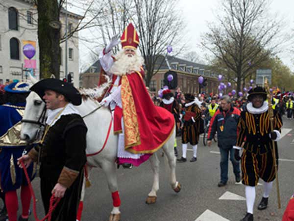 St Nicholas and Black Pete in Christmas parade in the Neatherlands.
